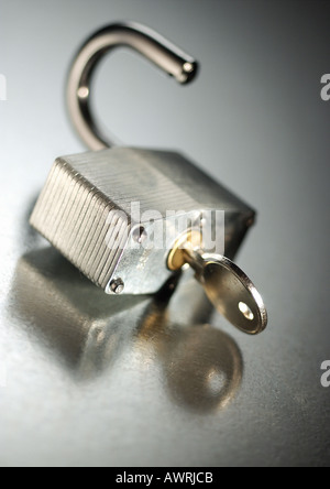 Key in padlock Stock Photo