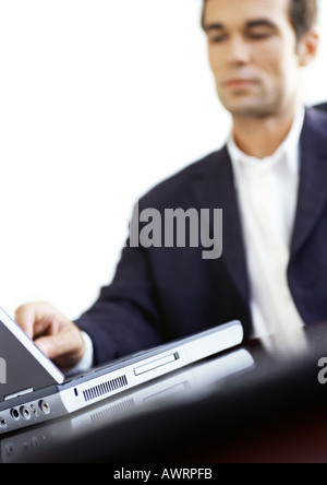 Businessman using laptop computer Stock Photo