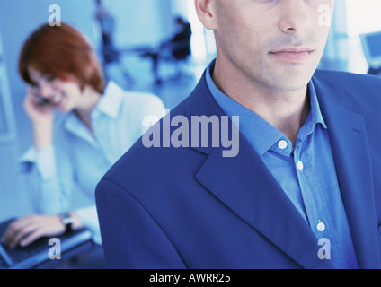Businesspeople in office, close-up Stock Photo