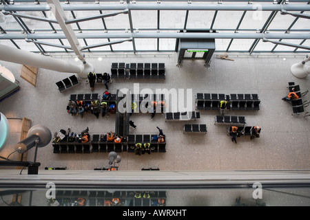 construction workers take a break at London Heathrow Airport terminal 5 Stock Photo