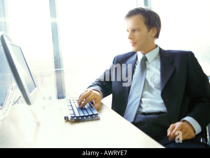 Businessman working on computer Stock Photo