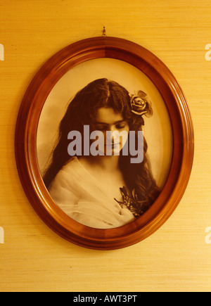 1920's vintage framed portrait of a young long-haired woman Stock Photo