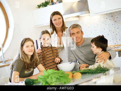 Family in kitchen, portrait Stock Photo