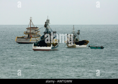 Fishing boats Puerto Lopez fishing Harbour Ecuador South America Stock Photo