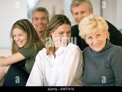 Five people grouped together, smiling, close-up, portrait Stock Photo
