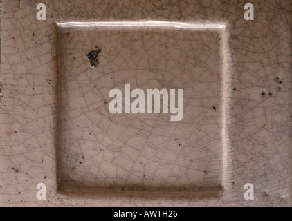 Raised square tile, close-up, full frame Stock Photo