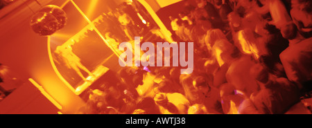Crowd of people dancing at nightclub, blurred Stock Photo