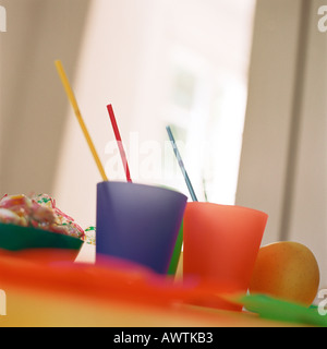 Colorful plastic cups with straws Stock Photo