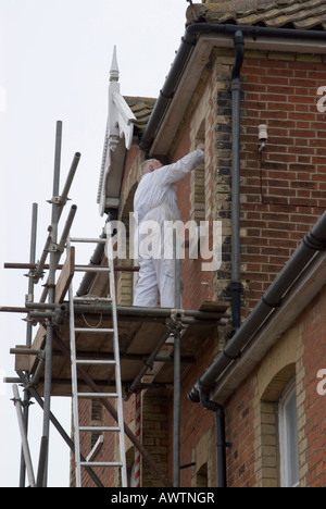Man Working On Scaffolding Stock Photo