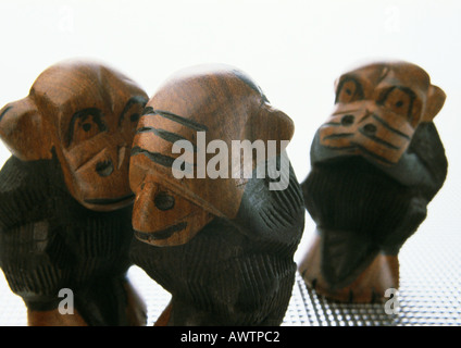 Three wise monkeys, sculpture, close-up Stock Photo