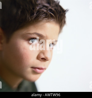 Boy looking at camera, close-up Stock Photo