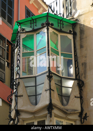 Enclosed glass balcony, or bay window, with green roof, Palma, Mallorca, Spain Stock Photo