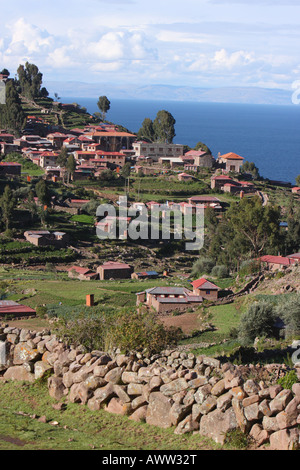The traditional Quechua village on Taquille (Taquile) Island, a popular tourist stop on Lake Titicaca, Peru. Stock Photo