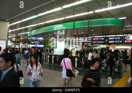 Crowded subway ticket hall, Shinjuku subway station,  JR Yamanote Line subway system, Tokyo Japan Stock Photo