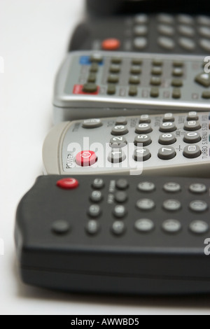 many remote controls for different appliances concept confusion Stock ...