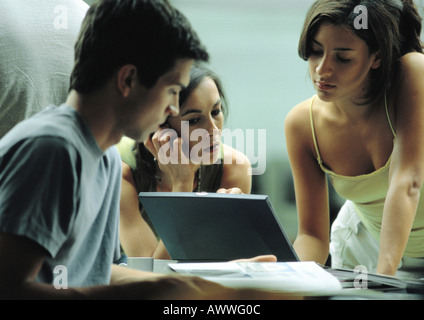 Group of people working on laptop Stock Photo