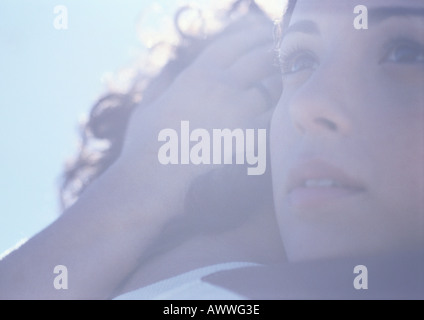 Portrait of young woman hugging man, close up Stock Photo