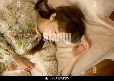 Young woman sleeping Stock Photo
