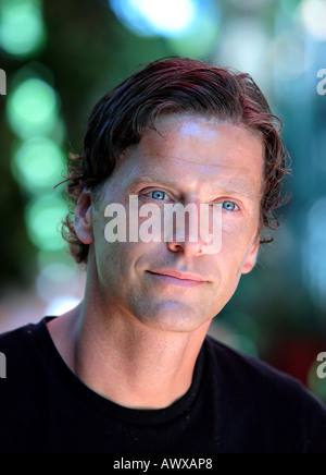 Portrait head shot of a handsome middle aged man with blue eyes Stock Photo