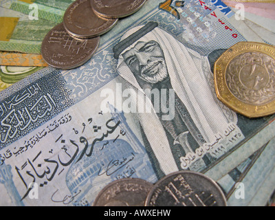 JORDAN. A pile of Jordanian dinars (notes and coins). Stock Photo
