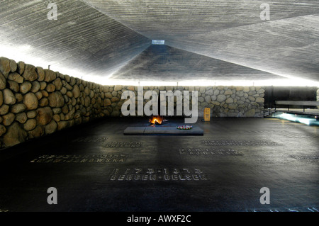 The Flame and Hall of Remembrance with death camps names at Yad Vashem memorial to the Holocaust in Jerusalem Israel Stock Photo