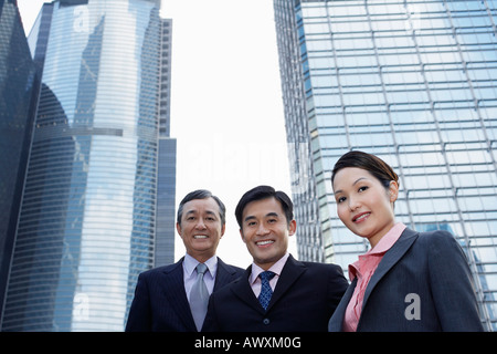 Three business associates, low angle view, portrait Stock Photo