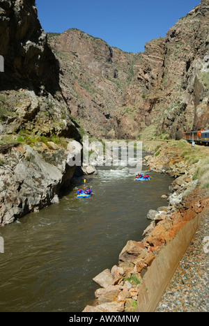 Rafters ride the Arkansas River as it runs through Royal Gorge Colorado USA Not model released Stock Photo