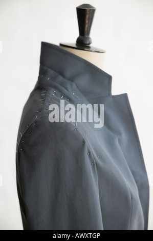 Mannequin with unfinished jacket , close up, side view Stock Photo