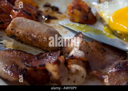 BBQ of bacon, eggs and sausages for breakfast Stock Photo