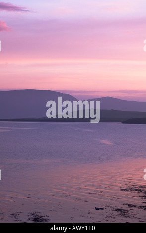dh  SCAPA FLOW ORKNEY Misty sea Hoy hills lilac pink pastel evening light skies dusk sunset tranquil calm seascape sky