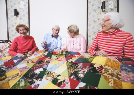 Seniors interacting at a quilting bee Stock Photo - Alamy