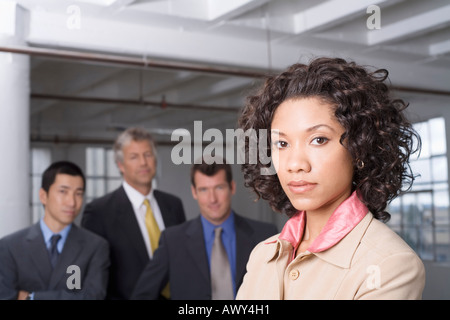 Portrait of Businesswoman with other Business People in Background Stock Photo