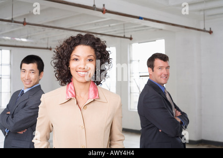 Portrait of Businesswoman with other Business People in Background Stock Photo