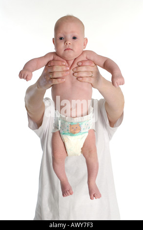 baby in mothers hands Stock Photo
