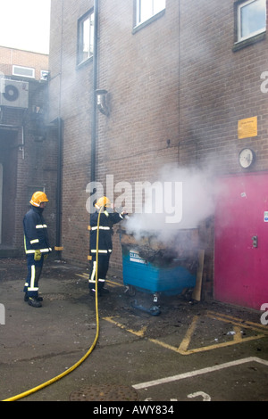 Fireman putting out Fire Hemel Hempstead Herts Stock Photo