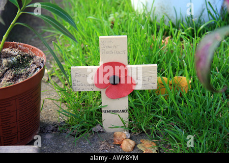 Cross laid by British family on the grave of Michael Wittmann in the La Cambe German Cemetery, Normandy, France. Stock Photo