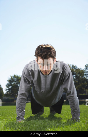 Man Doing Push Ups Stock Photo