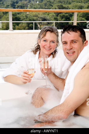 Mature couple having fun in the bathtub Stock Photo