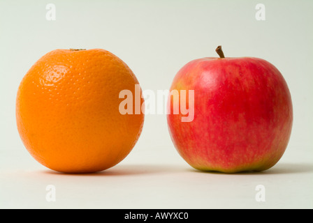 Comparing apples with oranges Stock Photo