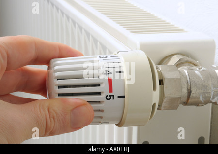 Thermostat valve on a radiator Stock Photo