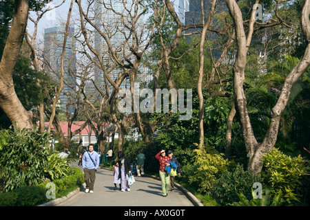 China, Hong Kong, People walking in Hong Kong Park Stock Photo