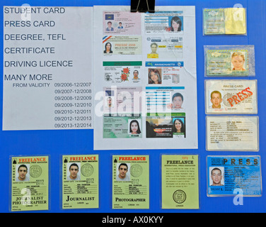 Advertising for falsified documents, selling fake ID on Khao San Road, Bangkok, Thailand, Southeast Asia, Asia Stock Photo