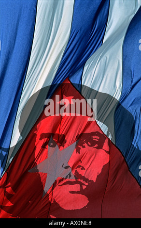 Detail of the Cuban national flag flowing in the wind with a superimposed image of Che Guevara CUBA Stock Photo