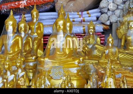 Buddha statues for sale along Bamrung Muang Road, Bangkok, Thailand, Southeast Asia Stock Photo