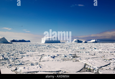 Icebergs off Franklin Island, helicopter in the air, Antarctica Stock Photo