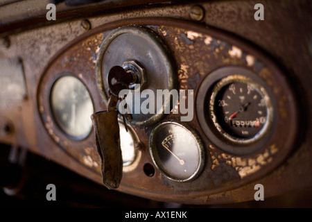Car keys in a rusty dashboard Stock Photo