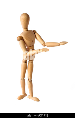 Wooden jointed mannequin gesturing as if presenting something, presentation, pointing Stock Photo