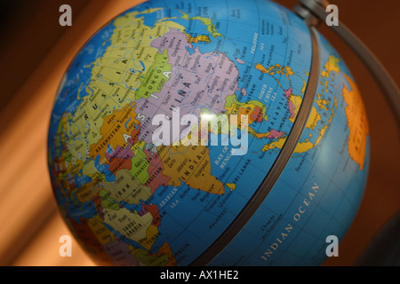 Globe on desktop showing Asia