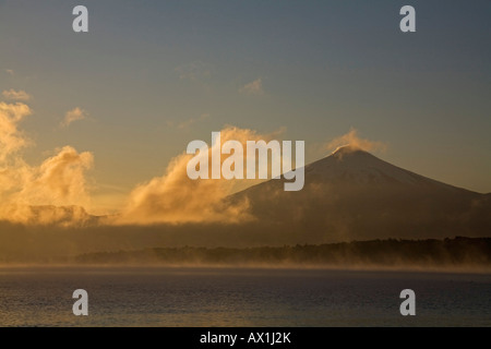 Sunrise at Vulcano Villarrica at the lake Lago Villarrica, Chile, South America Stock Photo