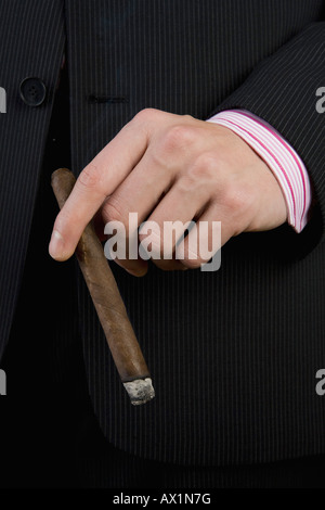 A businessman holding a cigar Stock Photo